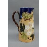 Doulton Lambeth Slaters Patent jug with art nouveau floral pattern and a blue glazed rim, with