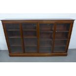 19th century mahogany bookcase with four glazed sliding doors and shelved interior, 146 x 234cm