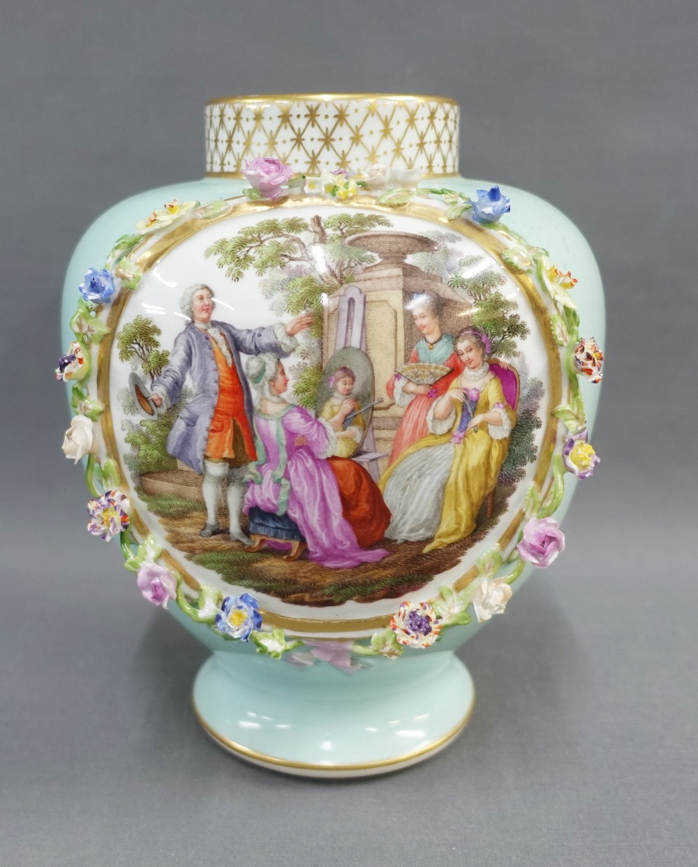 Continental porcelain vase with a handpainted panels with figures and opposing view flowers, against