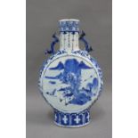 Chinese blue and white pilgrim / moon flask, with landscape panels and floral ground, has four