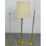 Three brass standard lamps of various design, 162cm high (3)