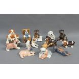 Set of twelve Royal Copenhagen mini collection porcelain dog figures, to include a dachshund and a