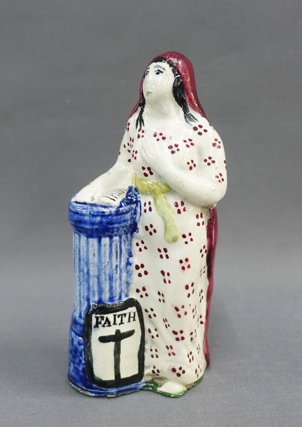 19th century Scottish pottery figure of Faith, 16.5cm high