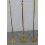 Three brass standard lamps of various design, 136cm high (3)