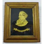 Gilt metal wall plaque of Charles Dickens, contained within a glazed frame, size overall 40 x 35cm