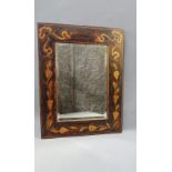 Early 20th century wall mirror with a stained wooden frame and rectangular bevelled plate, 36 x 46cm
