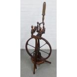 An oak spinning wheel by John Leitch of Galashiels, 121 x 46cm
