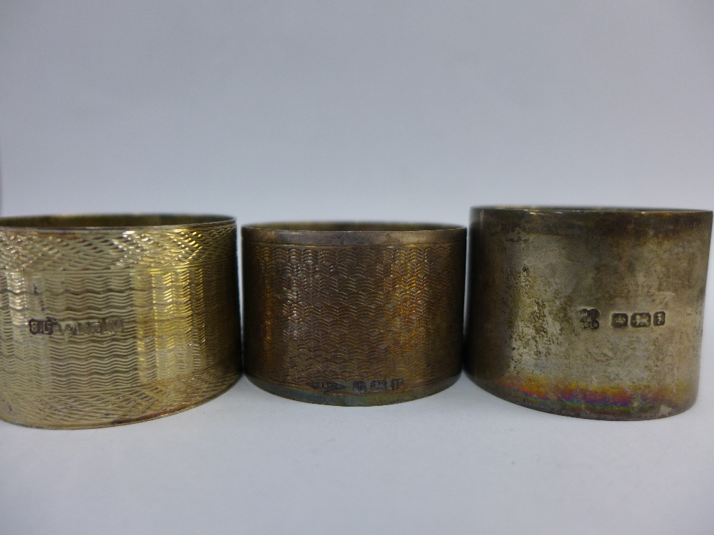 A collection of six various silver napkins, with a red leather napkin ring box (7) - Image 3 of 3