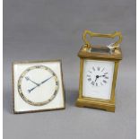 Brass and glass panelled carriage clock, the enamel dial with Roman numerals, height including