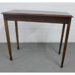 Mahogany any consul table with dentil frieze and square tapering legs with spade feet, 77 x 90cm