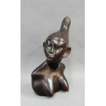 Ebonised hardwood bust of an African female figure, 24cm high