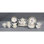 19th century English porcelain teaset with teapot, sucrier, milk jug, nine various cups, eight