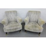 Pair of modern armchairs with upholstered in plush striped fabric, on wooden legs with brass