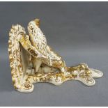 19th century cream glazed pottery wall shelf / bracket, with gilt highlights, 29cm long