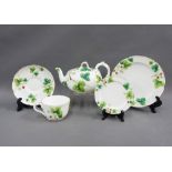 Mintons Blind Earl type cup, saucer and side plate trio together with matching teapot and small