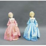 Two Royal Worcester 'Grandmother's Dress' figures by F.G. Doughty, one wearing a pink dress the