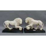 Pair of contemporary faux stoneware Lions, each on a black rectangular plinth base, 35 x 25cm (2)