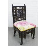 Early 20th century Moorish chair in the manner of Liberty & Co, with ebonised lattice bobbin