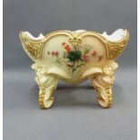 Royal Worcester blush ivory bowl raised on elephant head feet, painted with thistles to the
