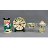 Mixed lot to include a silver rimmed continental porcelain vase, The Winker Toby jug and a pagoda