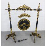 Black lacquered and gilt decorated gong, floor standing size complete with beater, 130 x 140cm