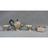 Epns three piece teaset and an Epns wine coaster (4)