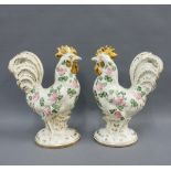 A pair of handpainted floral pattern cockerels, 29cm high (2)