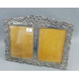 Silver fronted double photograph frame, stamped 925 Peru, (a/f) 47 x 35cm