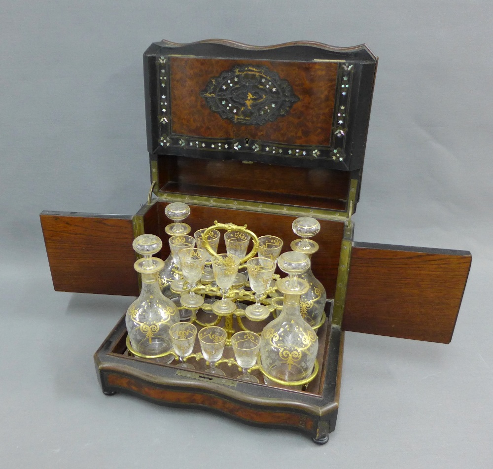19th century burr walnut, brass and abalone inlaid decanter box, with a hinged top and fold out
