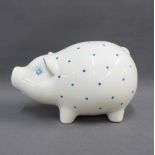 Tiffany & Co, blue and white glazed pottery money bank in the form of an pig, 22cm long