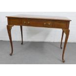 Mahogany writing desk with a single frieze drawer and raised on cabriole legs, 78 x 106cm