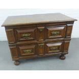 Oak and walnut chest, the rectangular top over two long drawers with ornate brass handles and raised