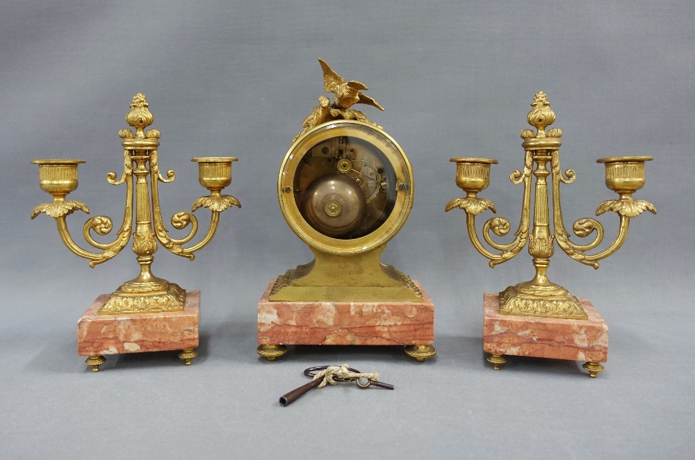Gilt metal and pink hardstone clock garniture, the dial surmounted by birds, brass movement striking - Image 3 of 3