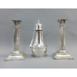 Pair of silver candlesticks, Birmingham 1897, 17cm high, together with a silver sugar castor,