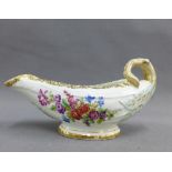 English porcelain cos lettuce sauceboat in the Worcester style, painted with flowers with gilt