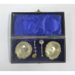A pair of Edwardian silver salts, complete with their original salt spoons, William Oliver,