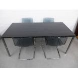 Modern smoked glass top dining table on chromed metal legs, 180 x 85cm, together with a set of