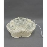 Belleek reticulated basket with weave pattern and encrusted flowers to the rim, 15cm wide