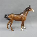 Beswick horse, modelled standing, with black printed backstamp, 22cm high