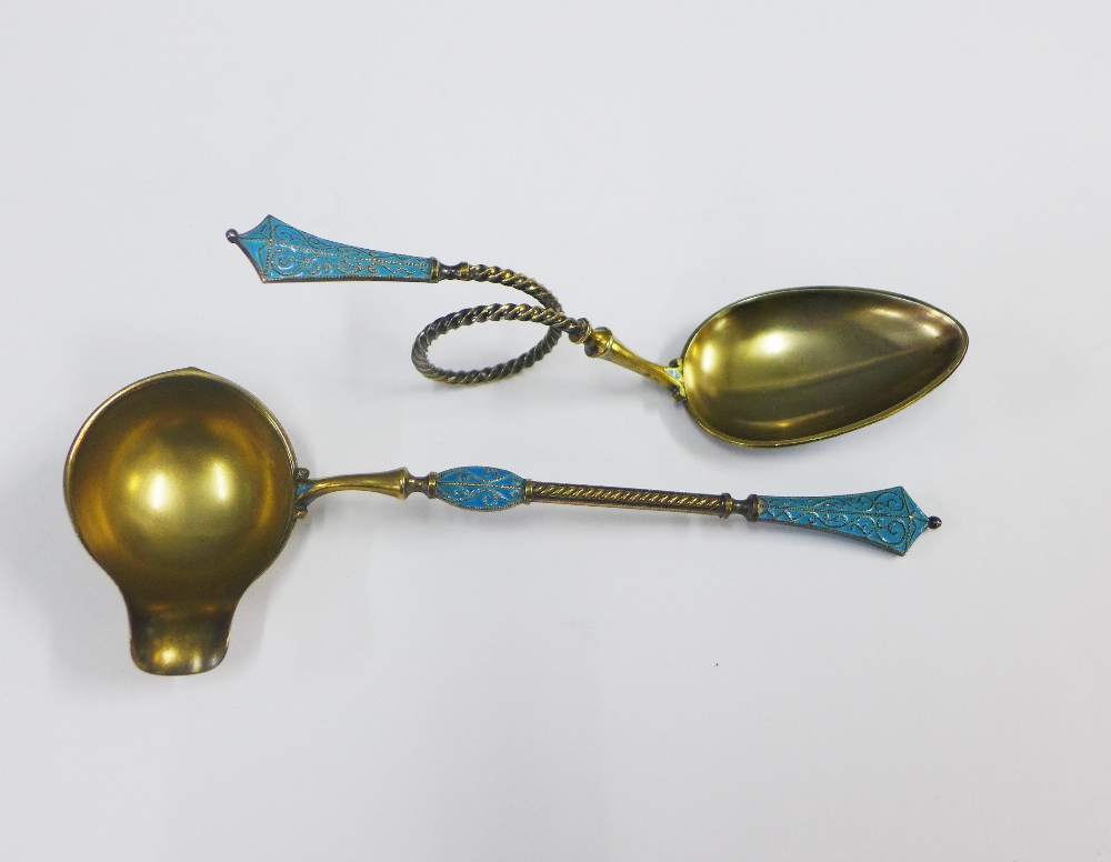 Norwegian style silver gilt and enamel spoon with a looped stem together with a matching ladle, both