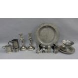 Carton containing a quantity of pewter to include candlesticks, charger, tankards and castors,