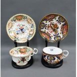 Derby Imari pattern cabinet cup and saucer together with another unmarked cup and saucer of