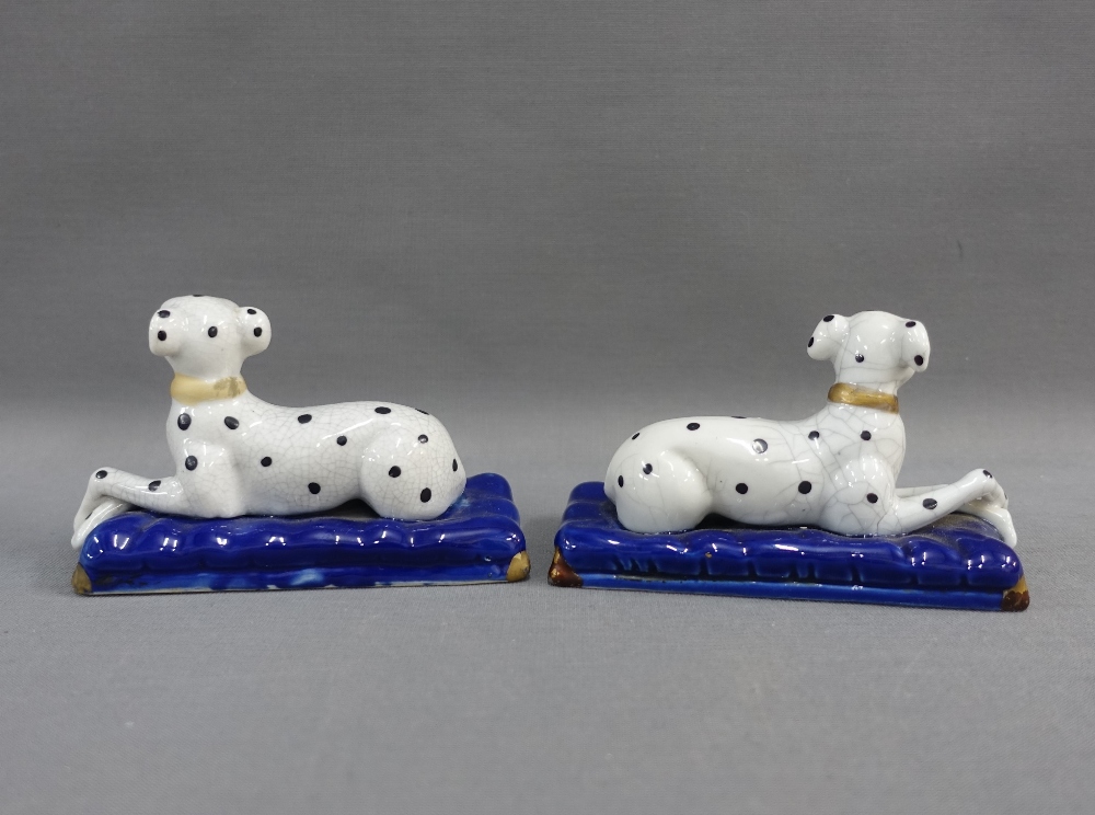 A pair of black and white hounds, on blue rectangular plinth bases, 13cm long (2) - Image 2 of 3