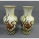 Two floor standing baluster vases, 54cm (2)
