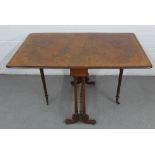 19th century walnut Sutherland table, with turned stretcher and brass castors, 73 x 116 x 70cm