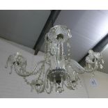 Moulded glass light fitting with five scrolling branches and lustre drops, 45cm drop