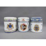 Set of three chinoiserie armorial pattern jar and covers, one with a blue and white stag, 17cm