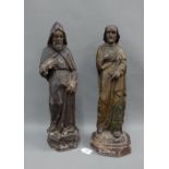 Two painted wooden figures of Saints, likely St Joseph and St Francis, 56cm, (2)