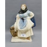 McClintock, a pottery figure of a Fishwife, 27cm high