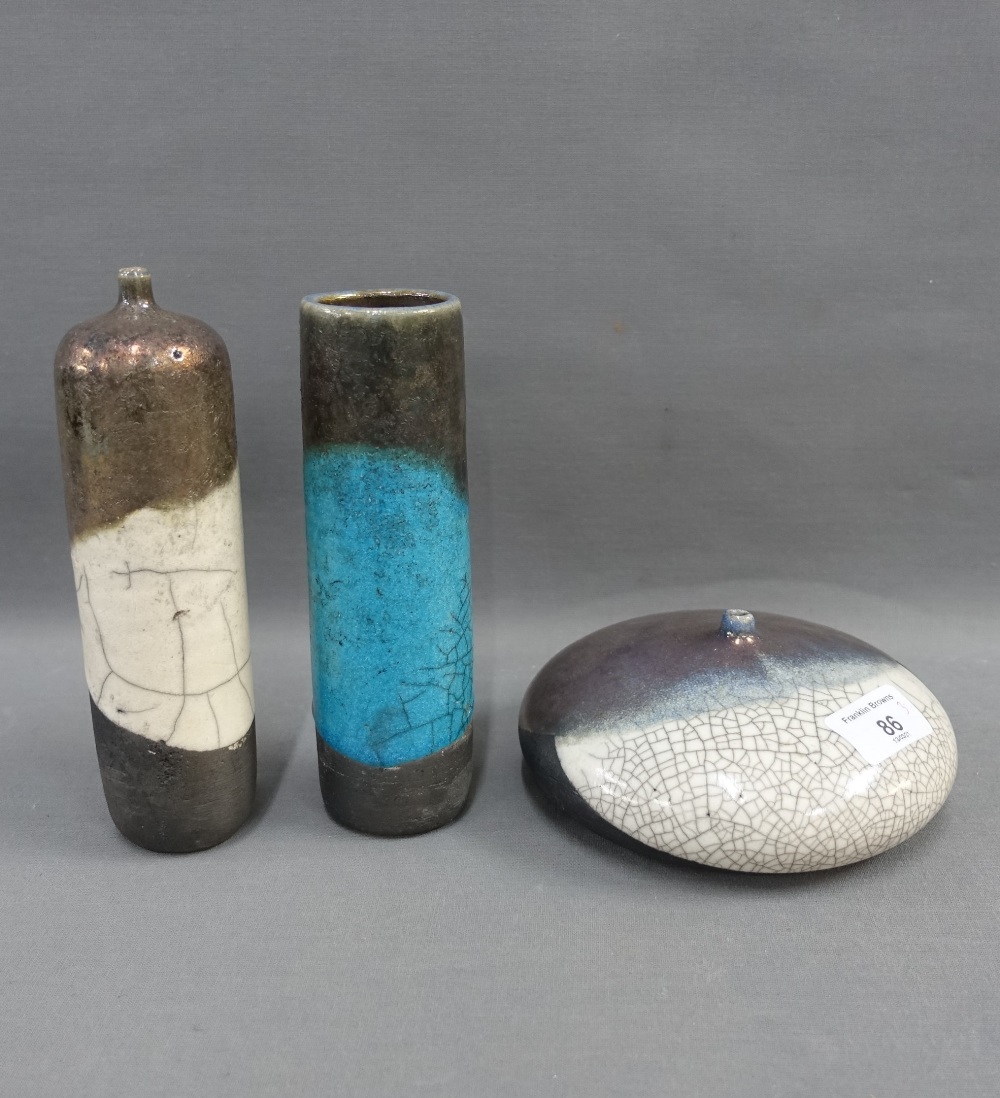 Collection of studio pottery to include two cylindrical vases and another of flattened form, incised